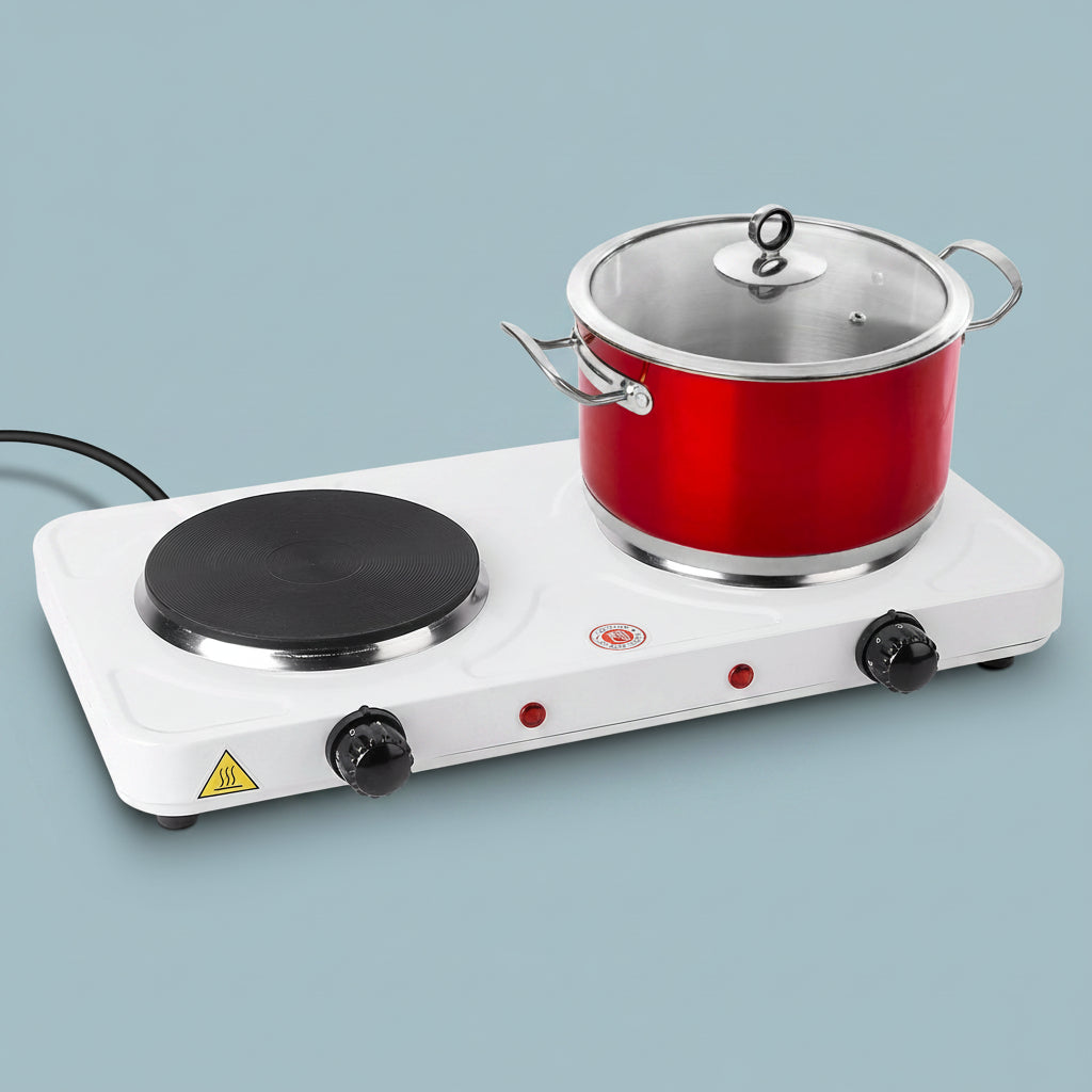 Single-burner electric stove with a red pot on a white background
