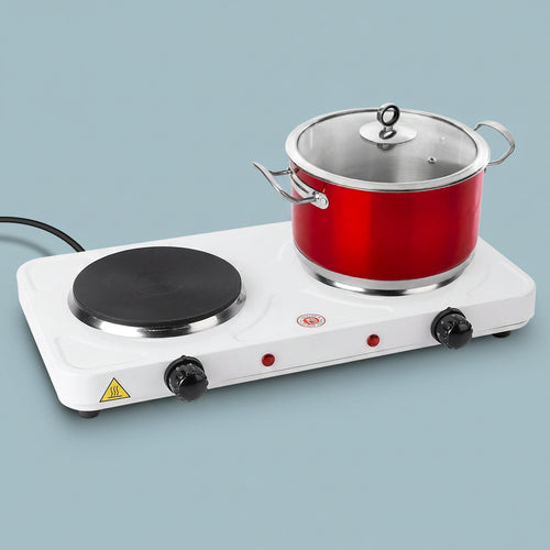 Single-burner electric stove with a red pot on a white background