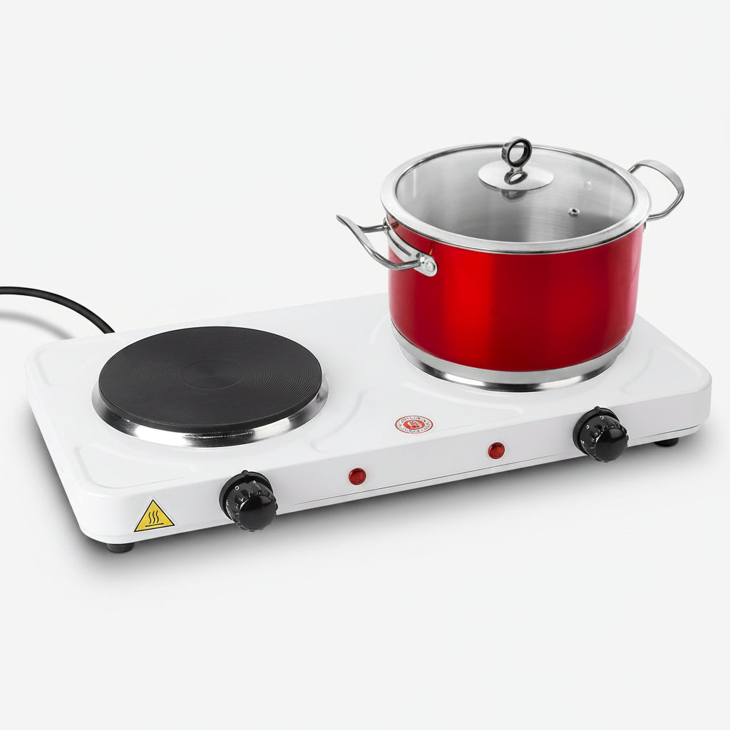 Single-burner electric stove with a red pot on a white background
