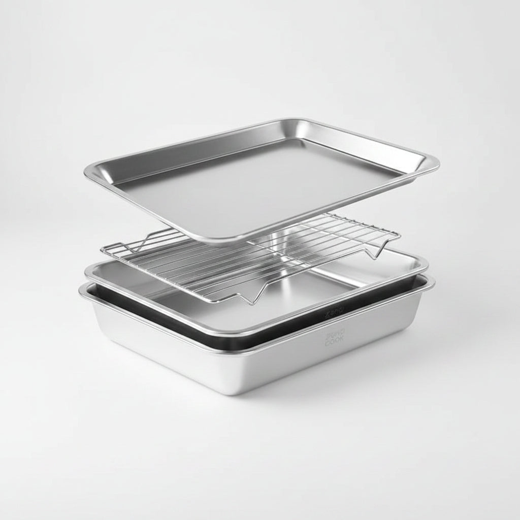 Set of three stainless steel baking pans on a white background